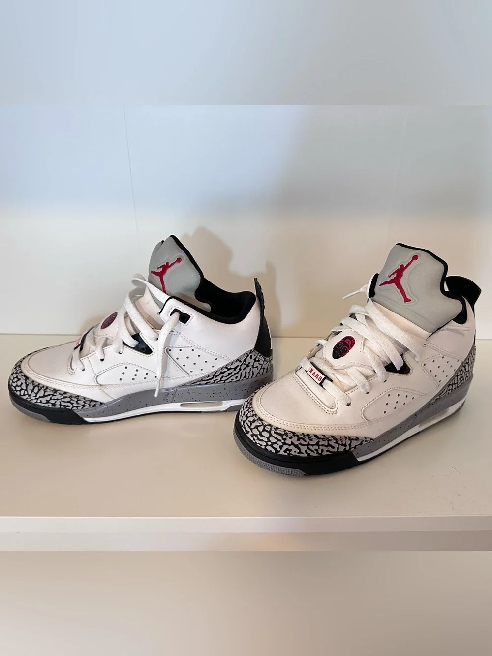 Jordan Son of Mars Low Basketball Sneakers in White, Black and Red Boy 4.5Y